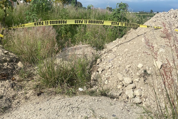 Aparece cuerpo desmembrado durante excavaciones en Banco de Arena en Coronango, Puebla