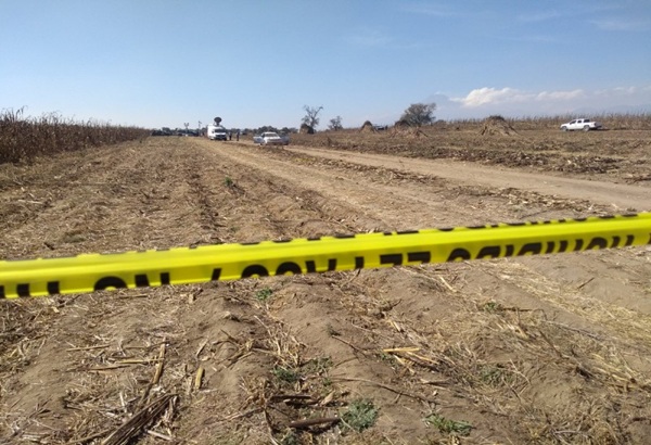 Localizan dos cadáveres maniatados en San Isidro Labrador, en Izúcar de Matamoros